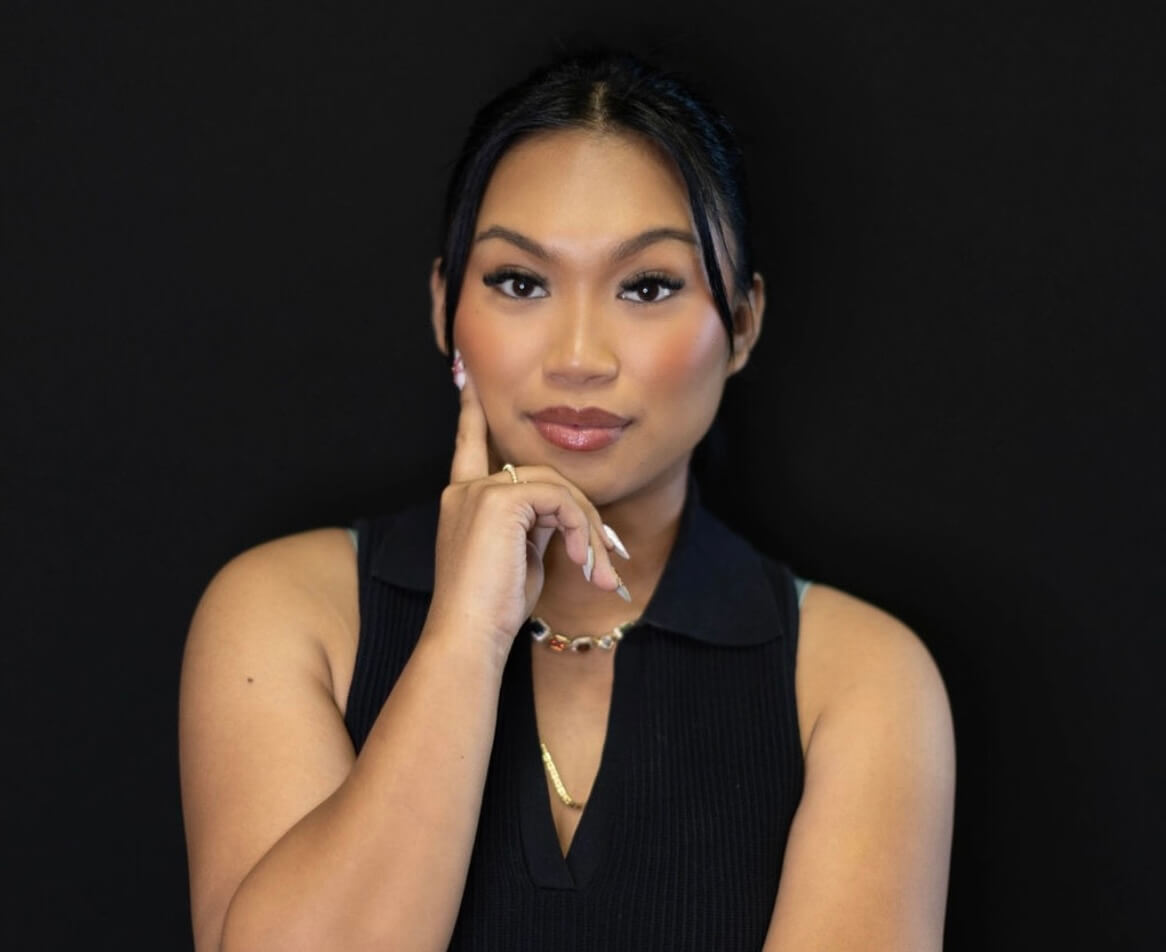 Portrait of lash and brow professional in black sleeveless top